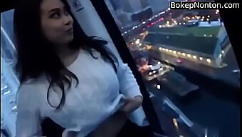 Stunning Young Woman Reveals Her Large Breasts In A Public Setting.