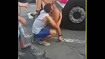 A Man Pleasuring A Woman'S Genitals In Public