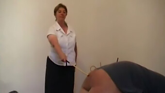 Older Woman Punishes Younger Man With Cane